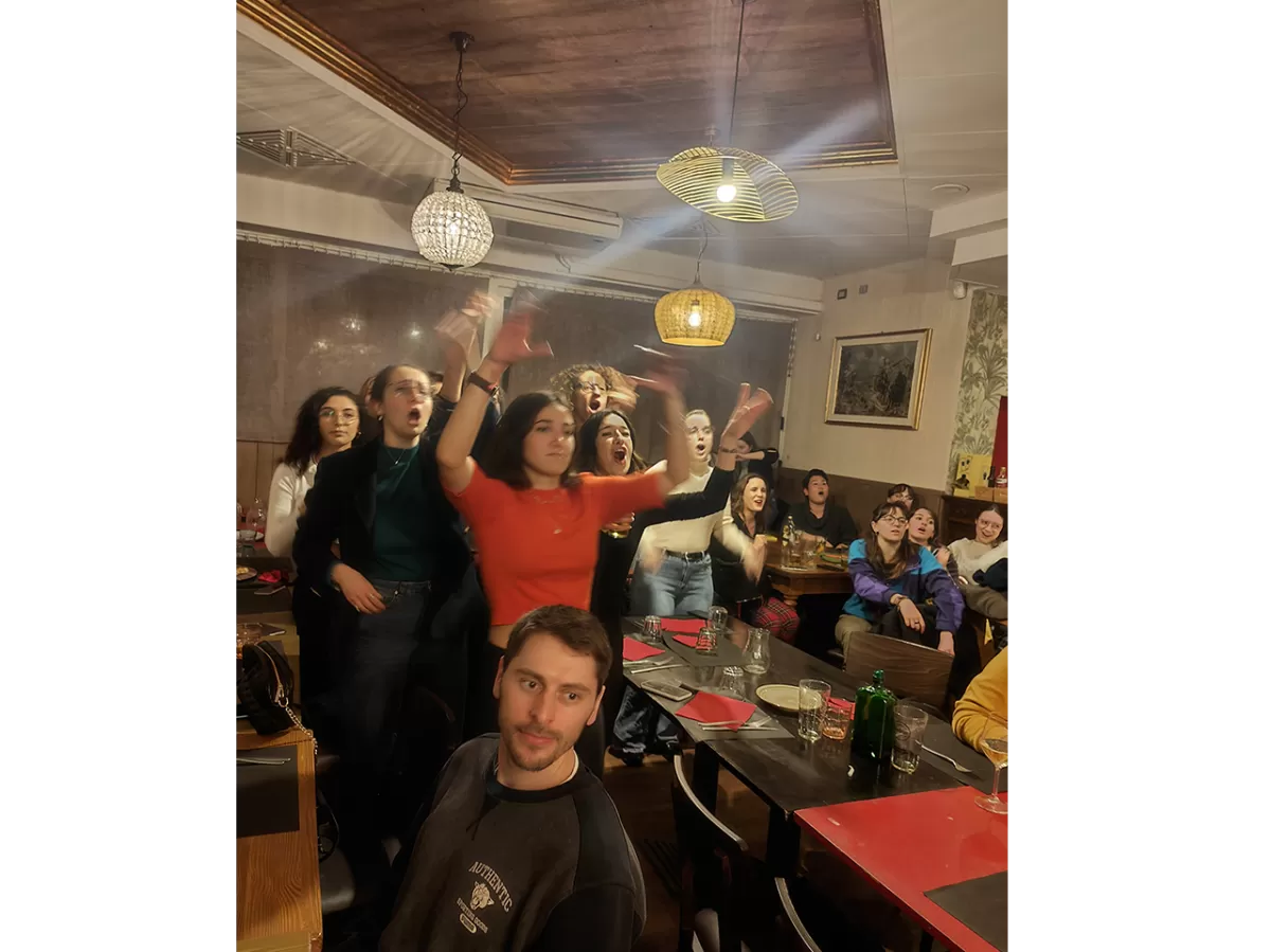 ESNers singing and dancing together