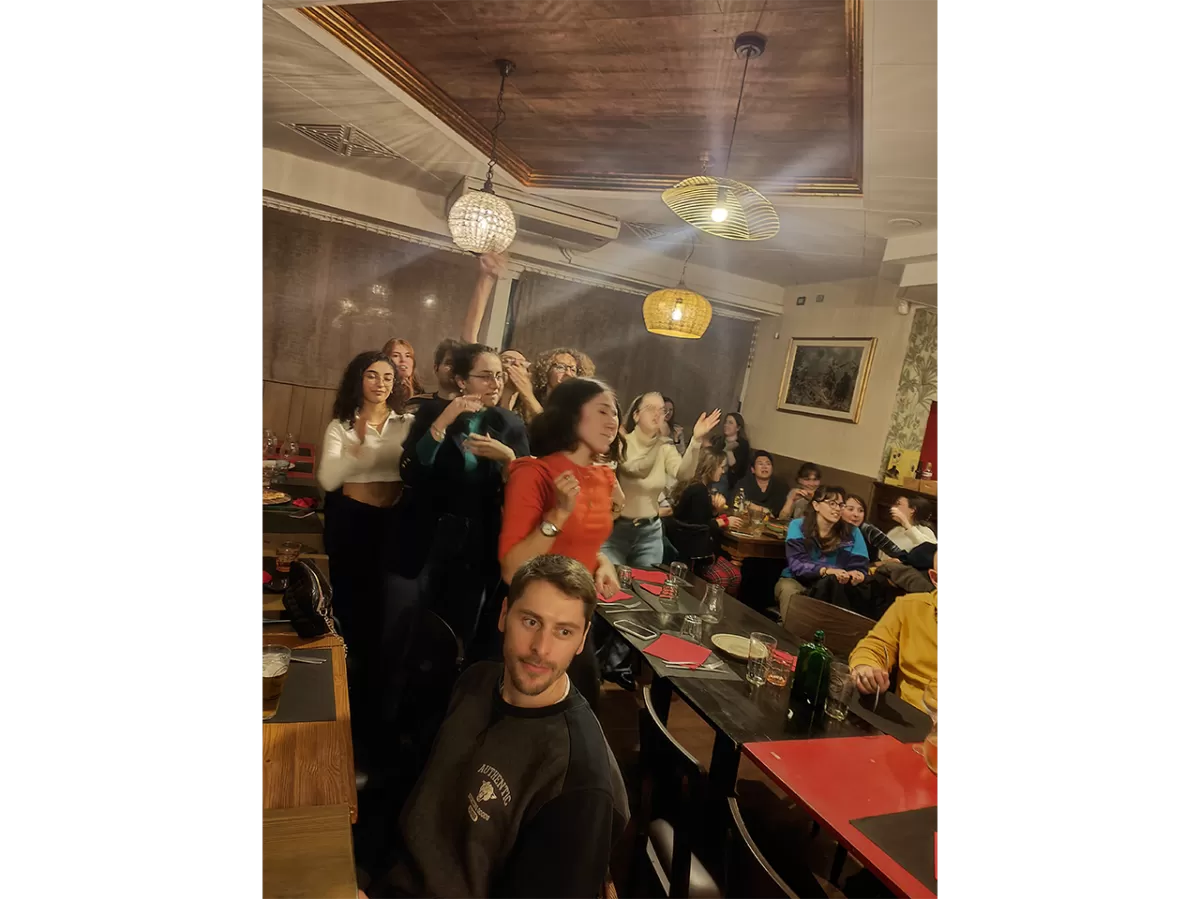 ESNers singing and dancing together