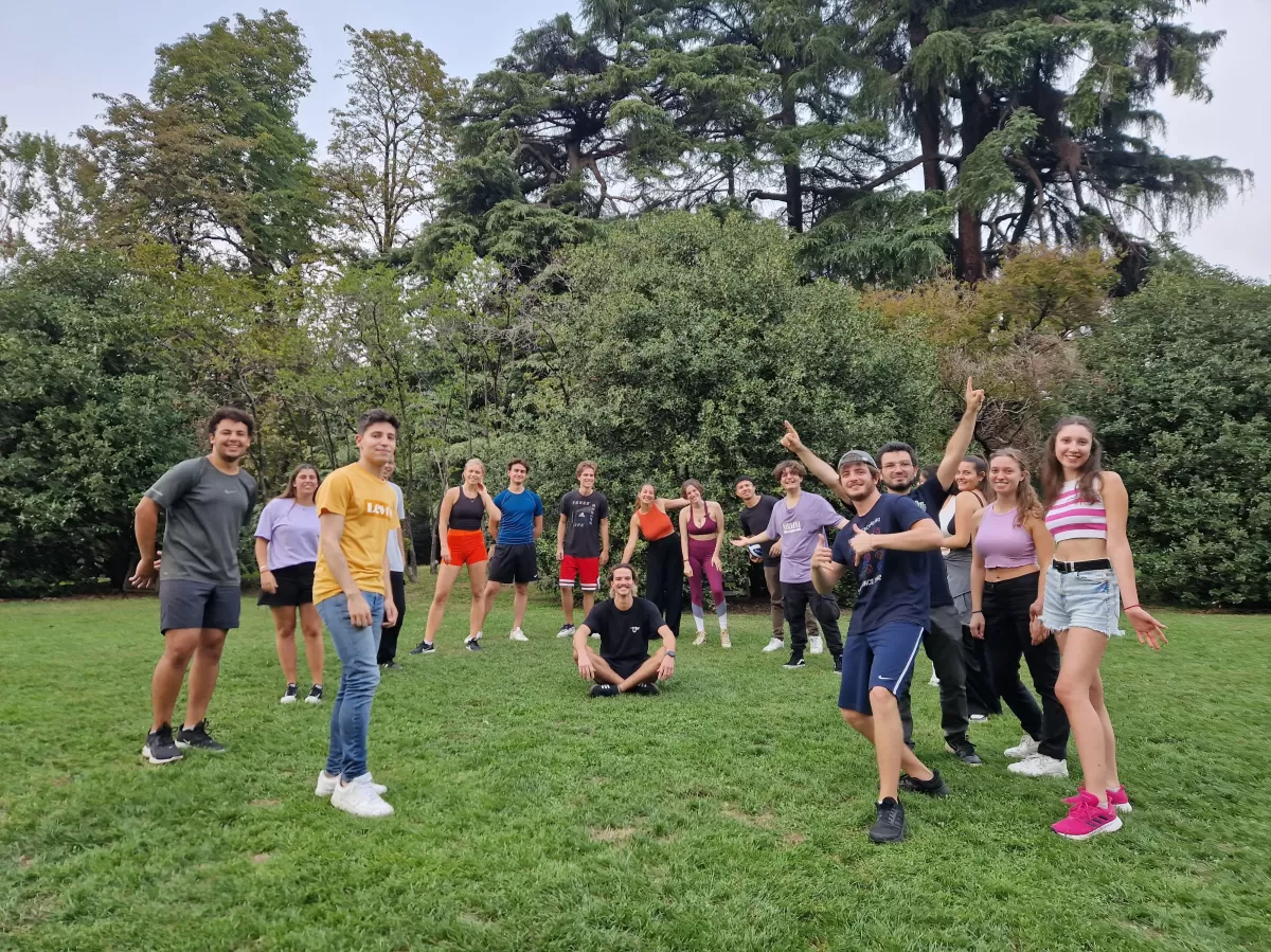 A picture of the group playing in the park.