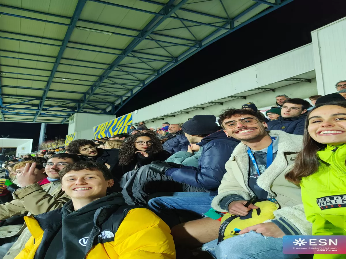 selfie of erasmus students and volunteers in the stadium