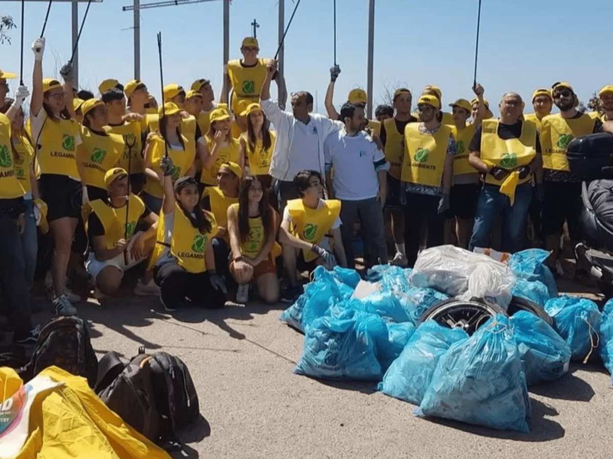international students and local students with the litter they collected