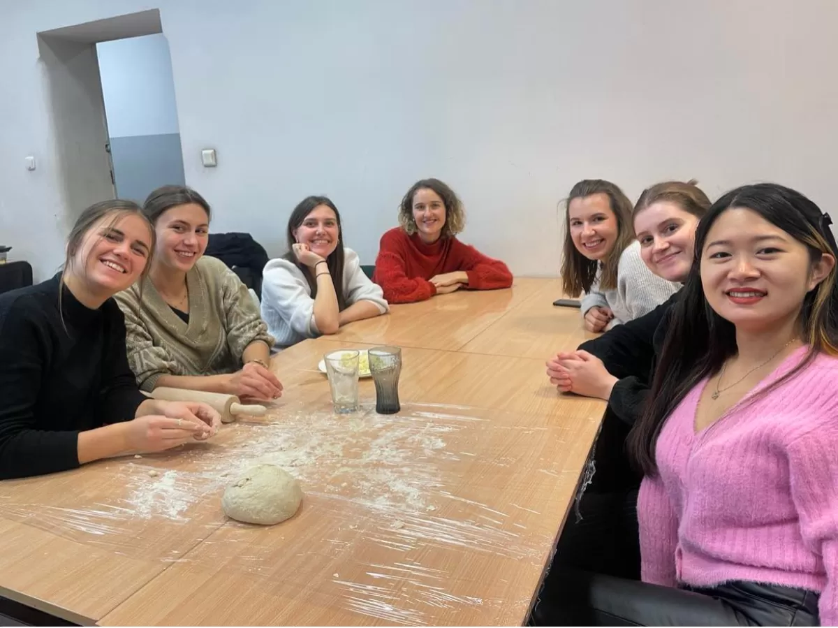 Erasmus students making dumplings