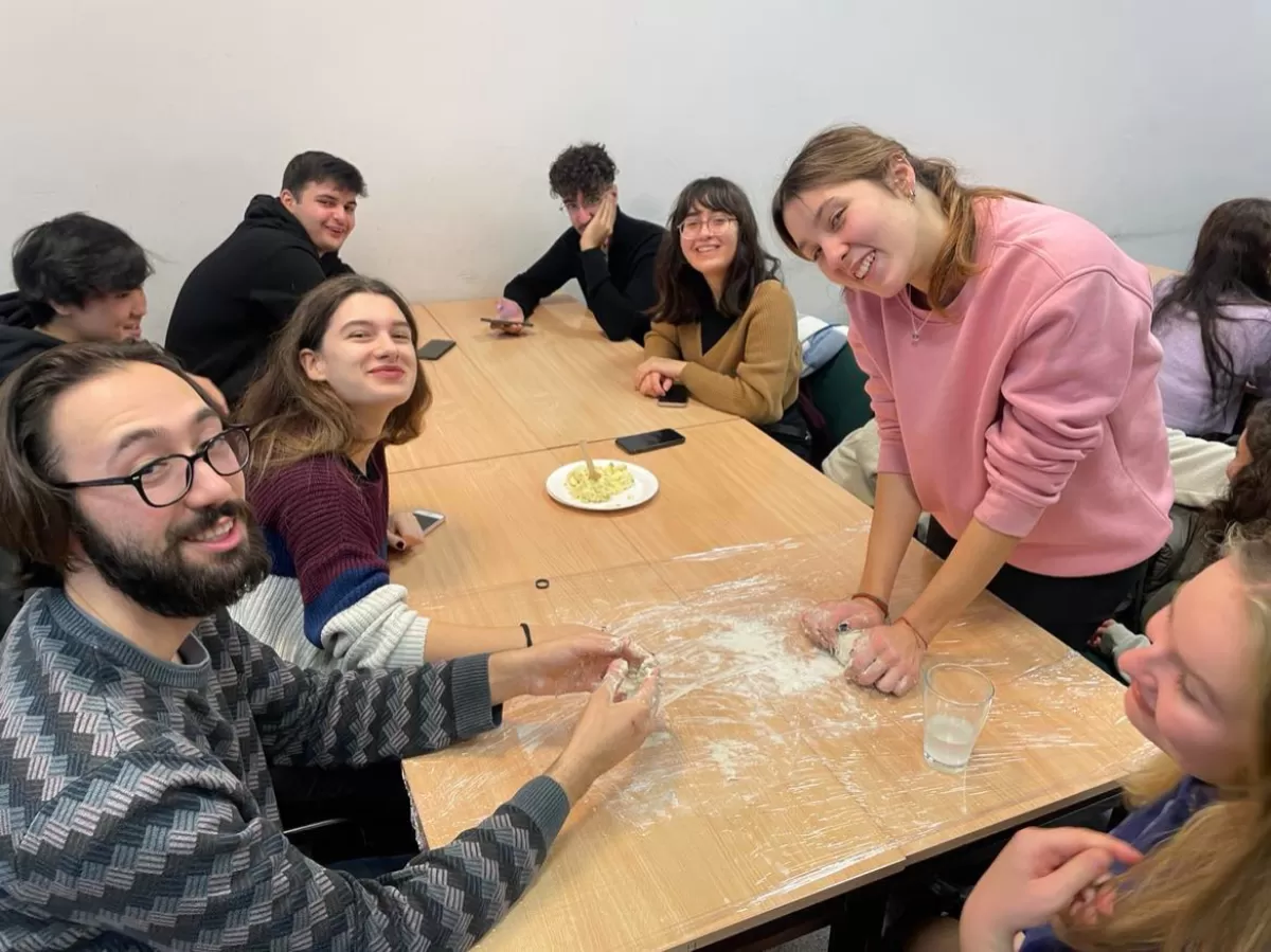 Erasmus students making dumplings