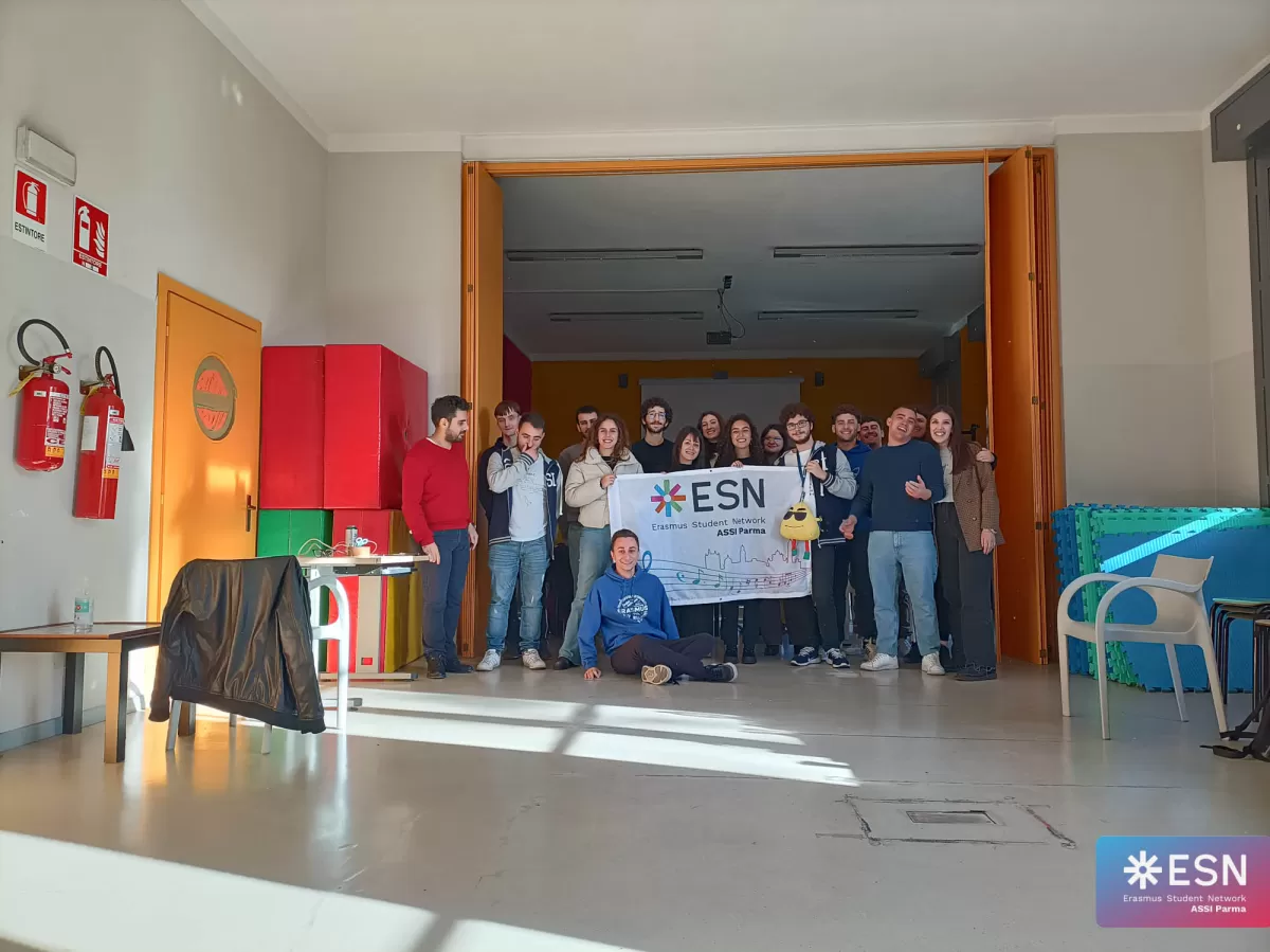 Participants posing with the flag