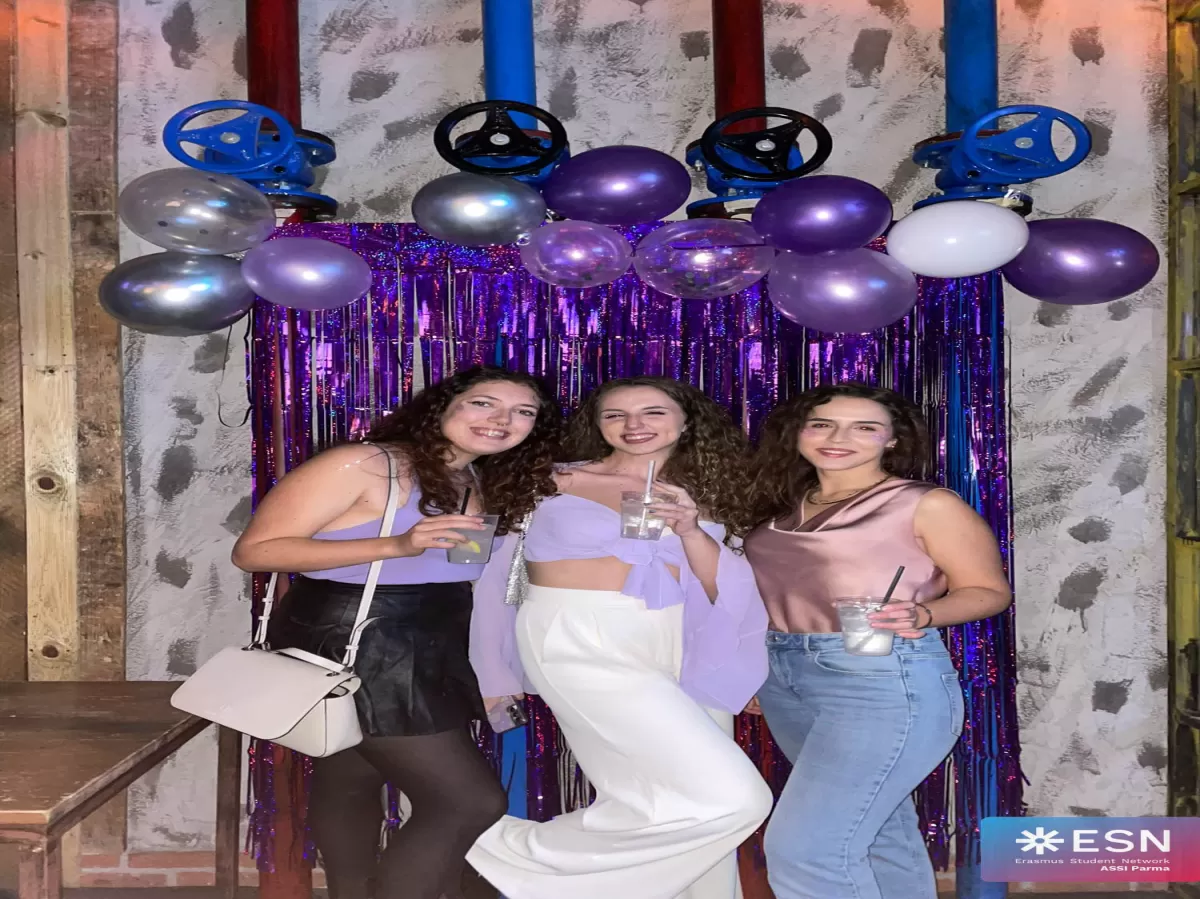 group of three people smiling