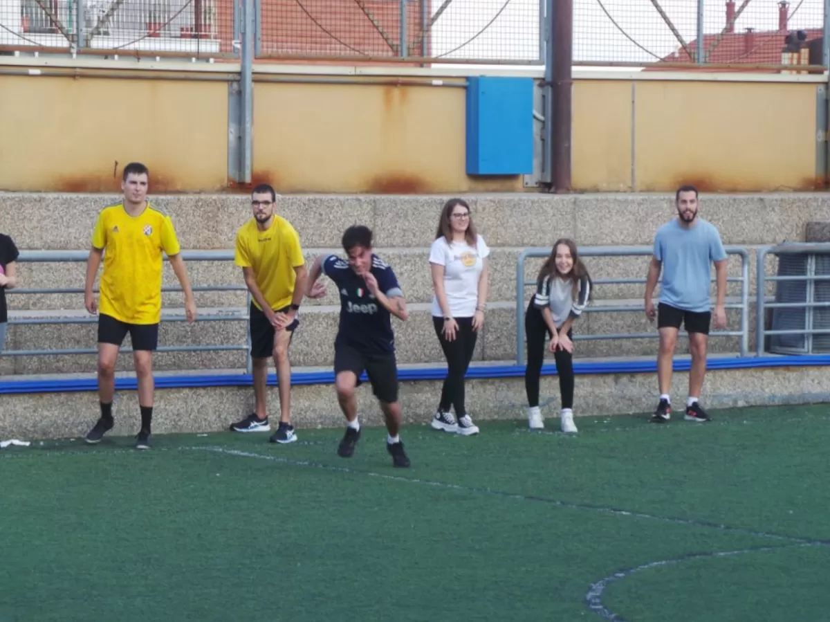 students playing on a futsal pitch
