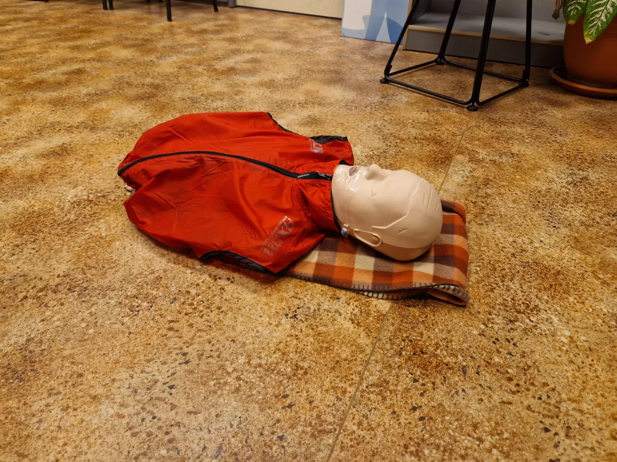 A mannequin lying on the floor