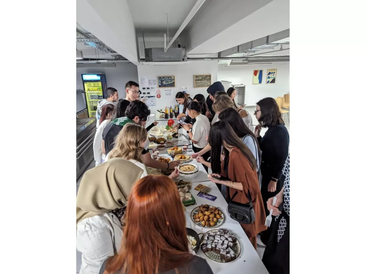 Group of international students tasting different and delicious dishes from different cultures