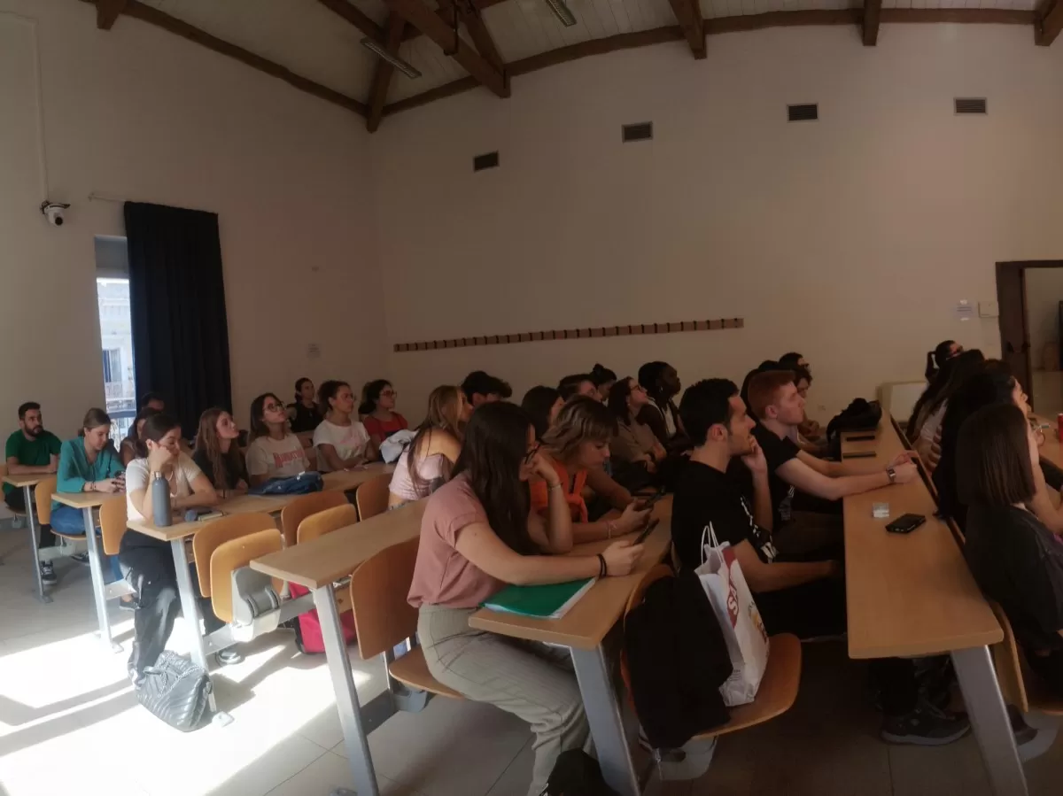 Panoramic photo of the local students attending the event