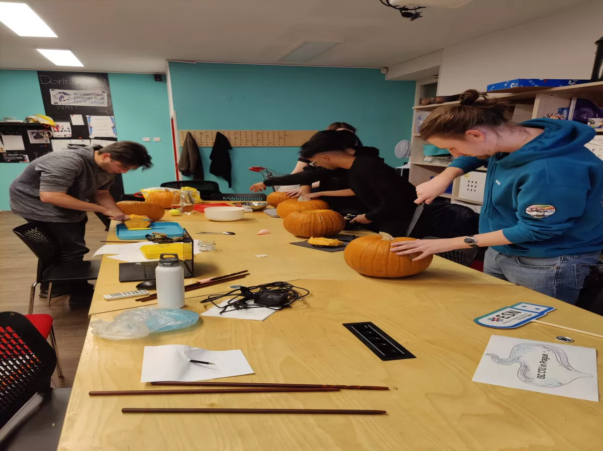 Carving out faces of the pumpkins