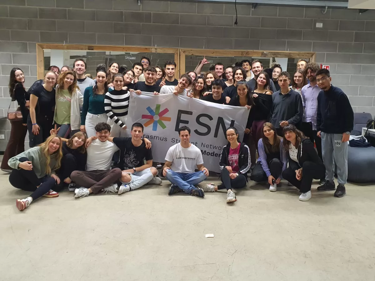 Group of international students with ESN Modena flag