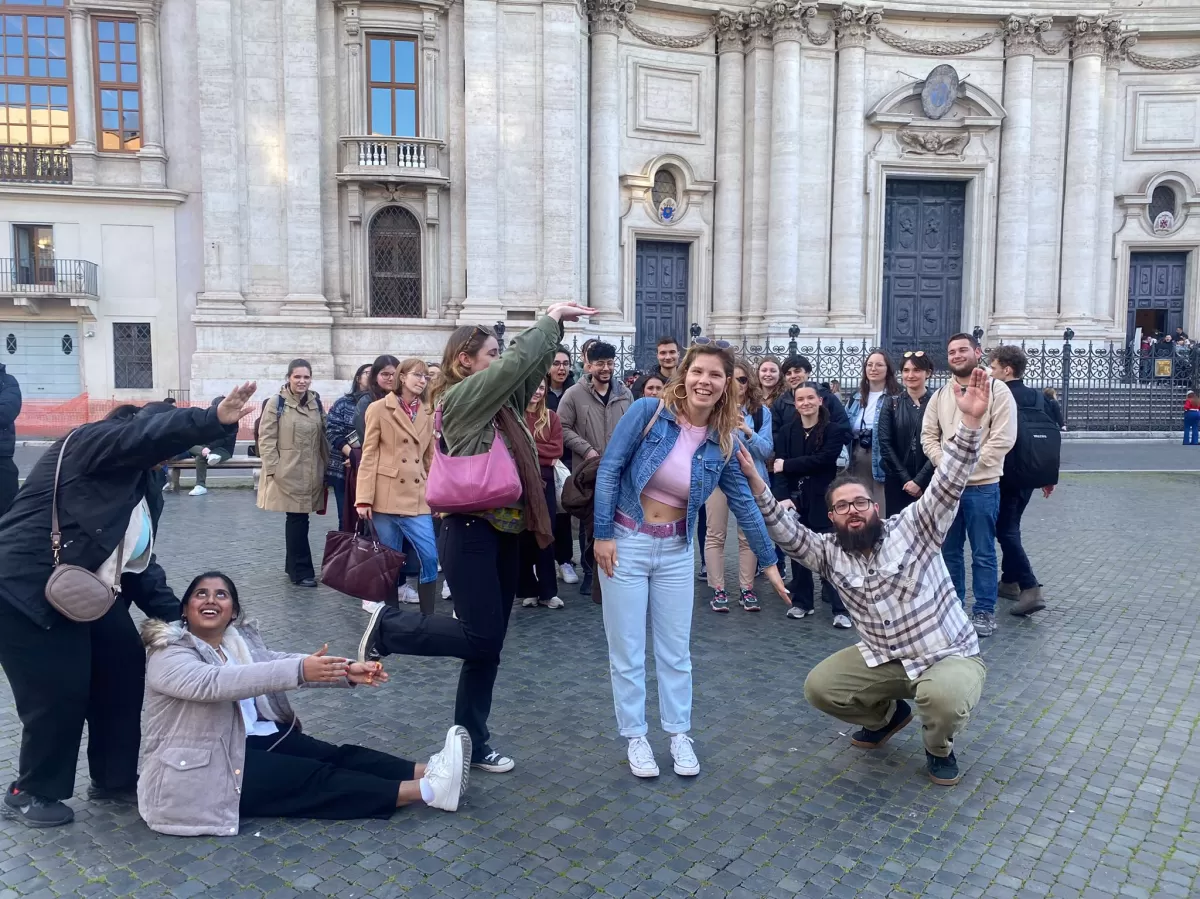 A group picture in Piazza Navona with the erasmus doing "ESN" sigla as a challenge