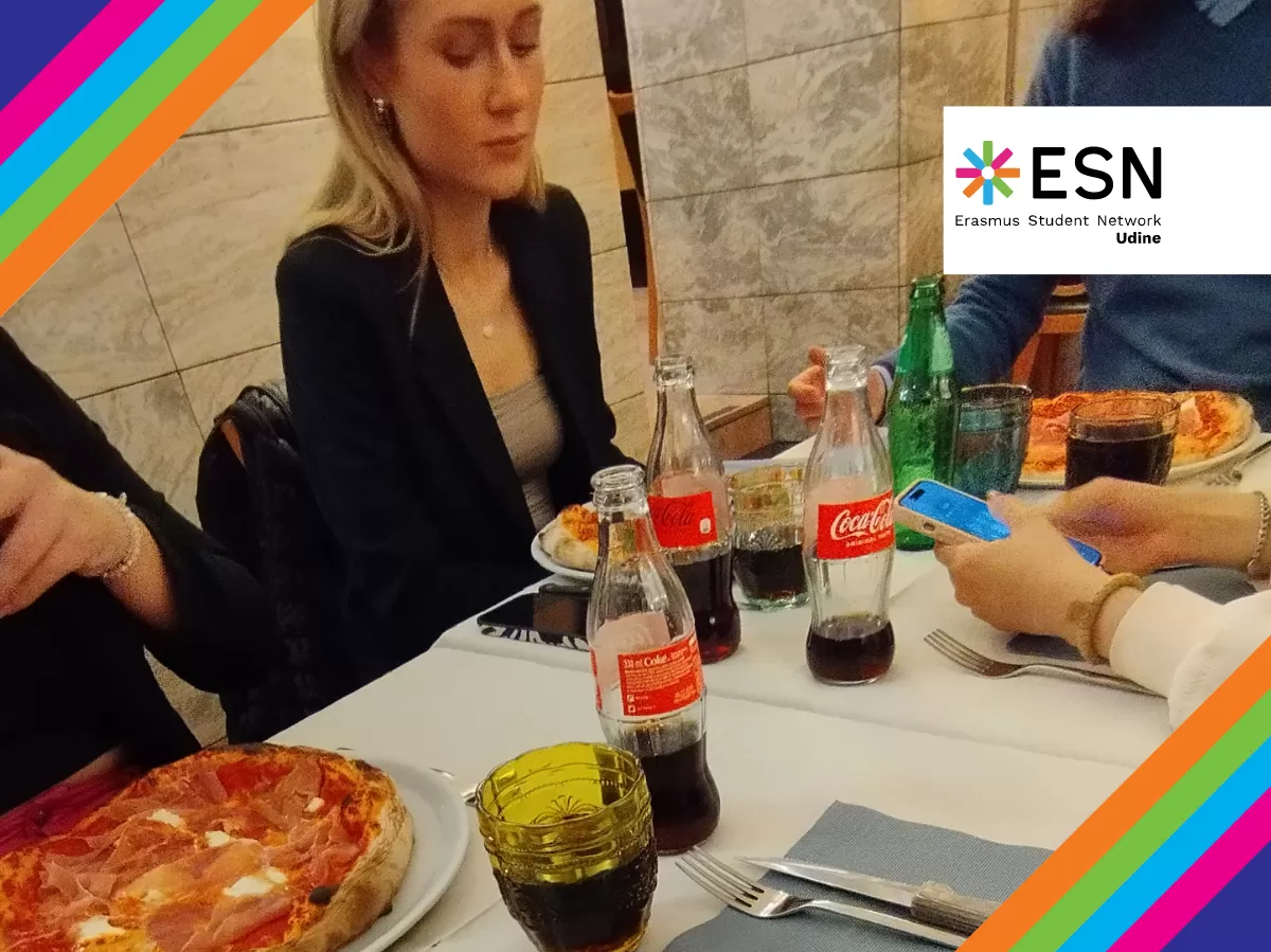 international students with pizza