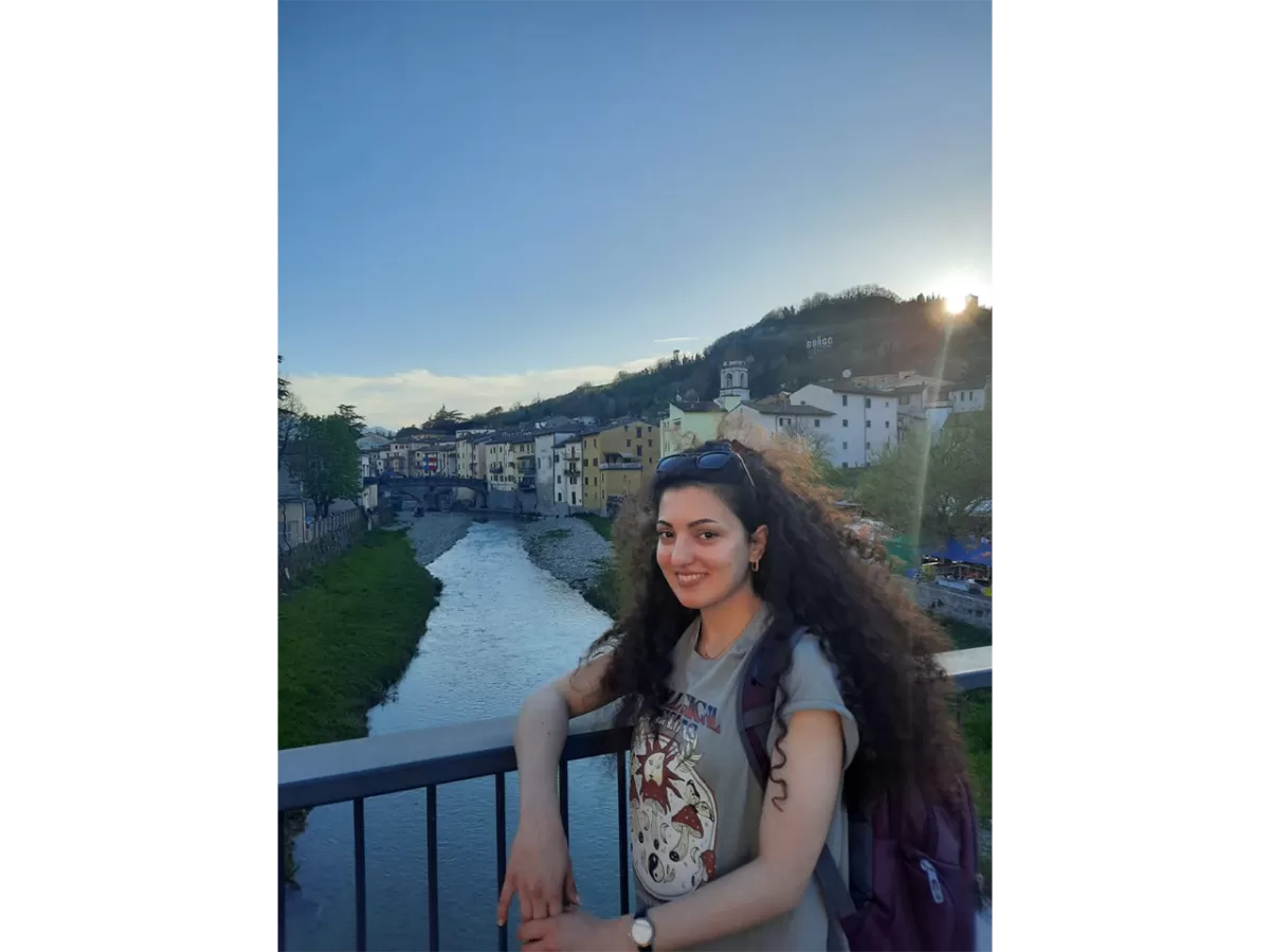 A picture of our Erasmus student during the city tour of Rocca San Casciano. Behind her the river which divides the two factions: "Mercato" and "Borgo"