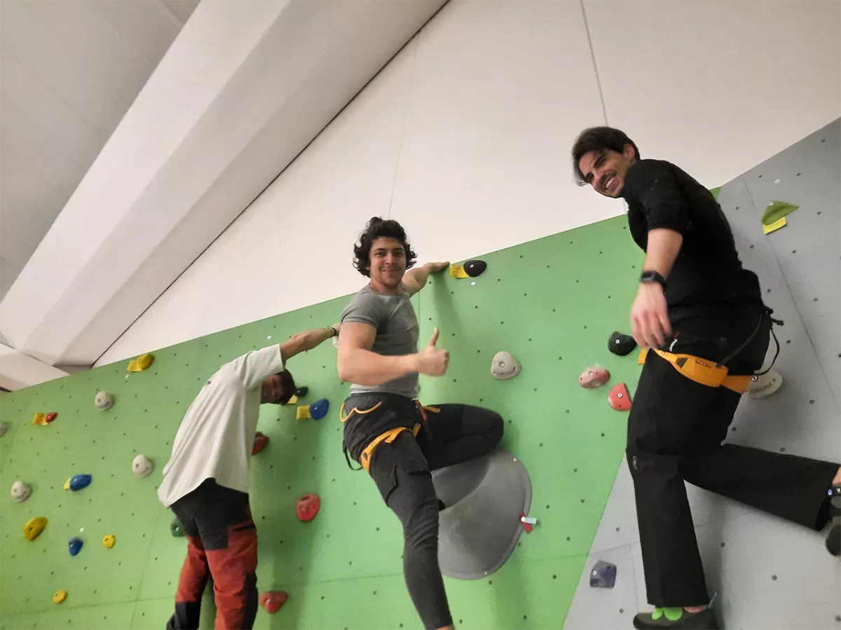3 ESNers who reach the top of the boulder wall