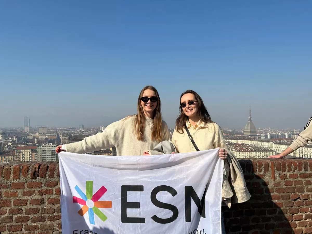 two erasmus with the flag