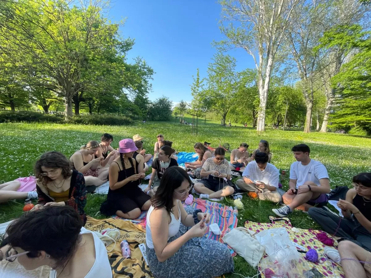 Participants learning how to knit