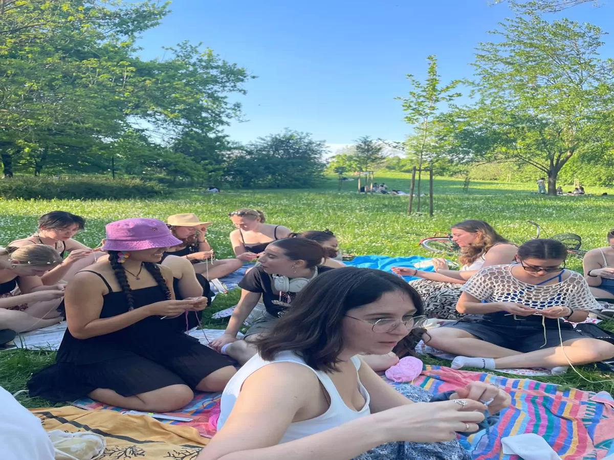 Participants learning how to knit