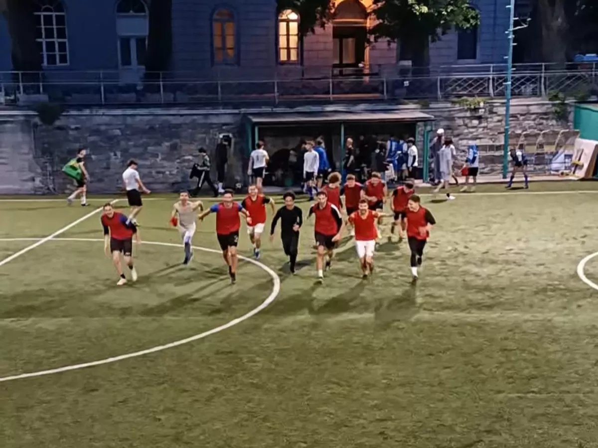 Players running towards the fans after winning a match