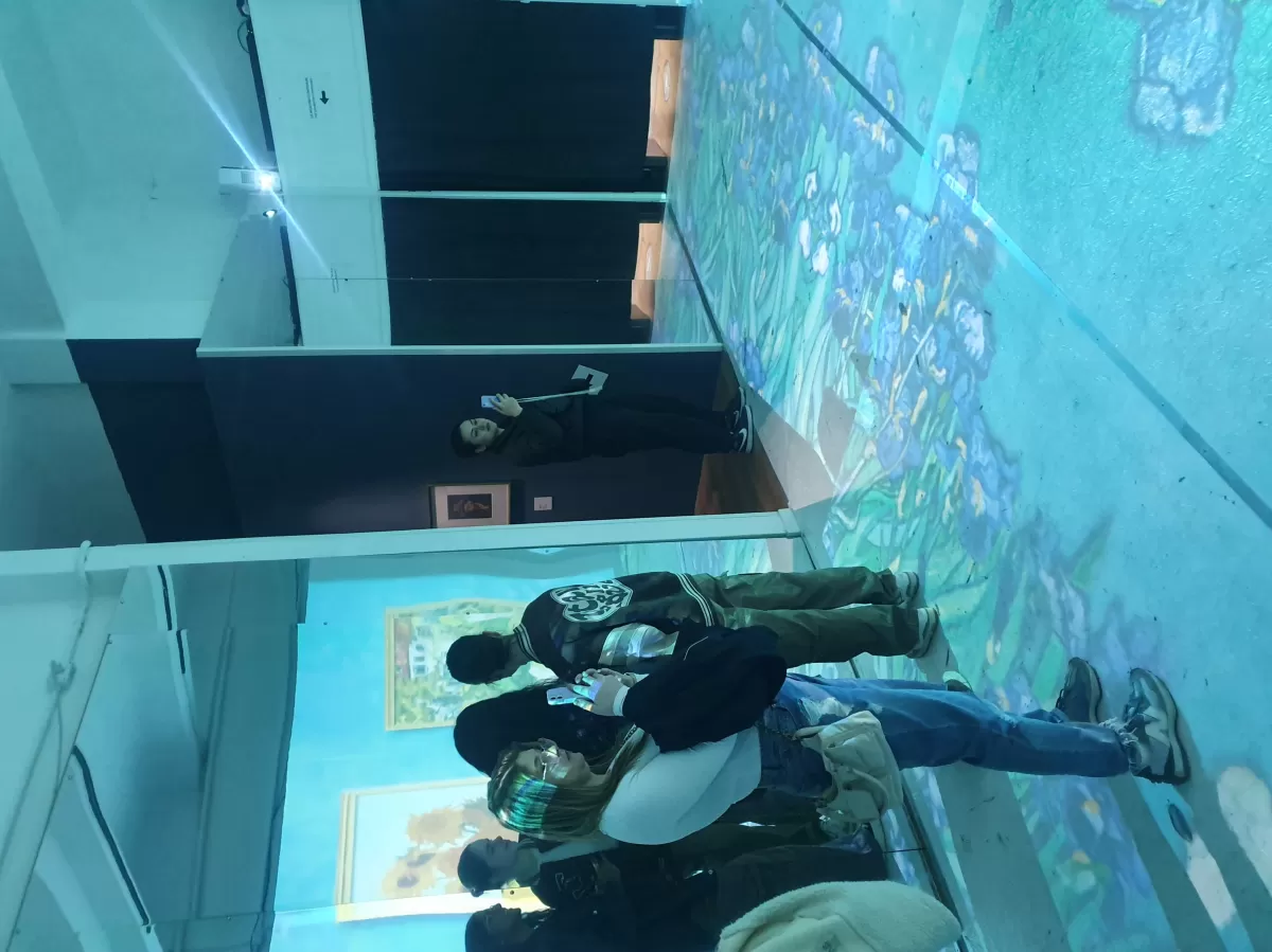 participants taking pictures in the exhibition