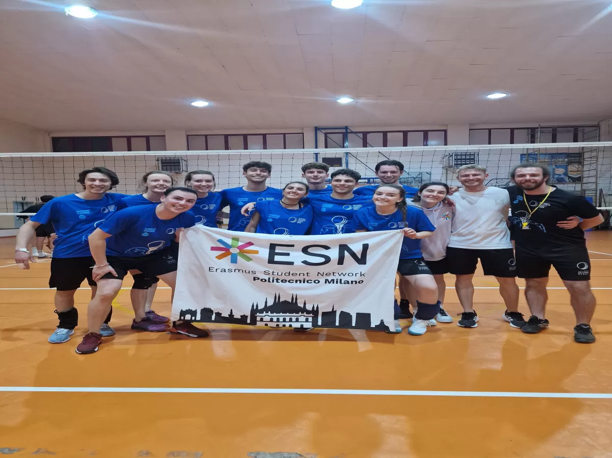 The volleyball team with the ESN flag