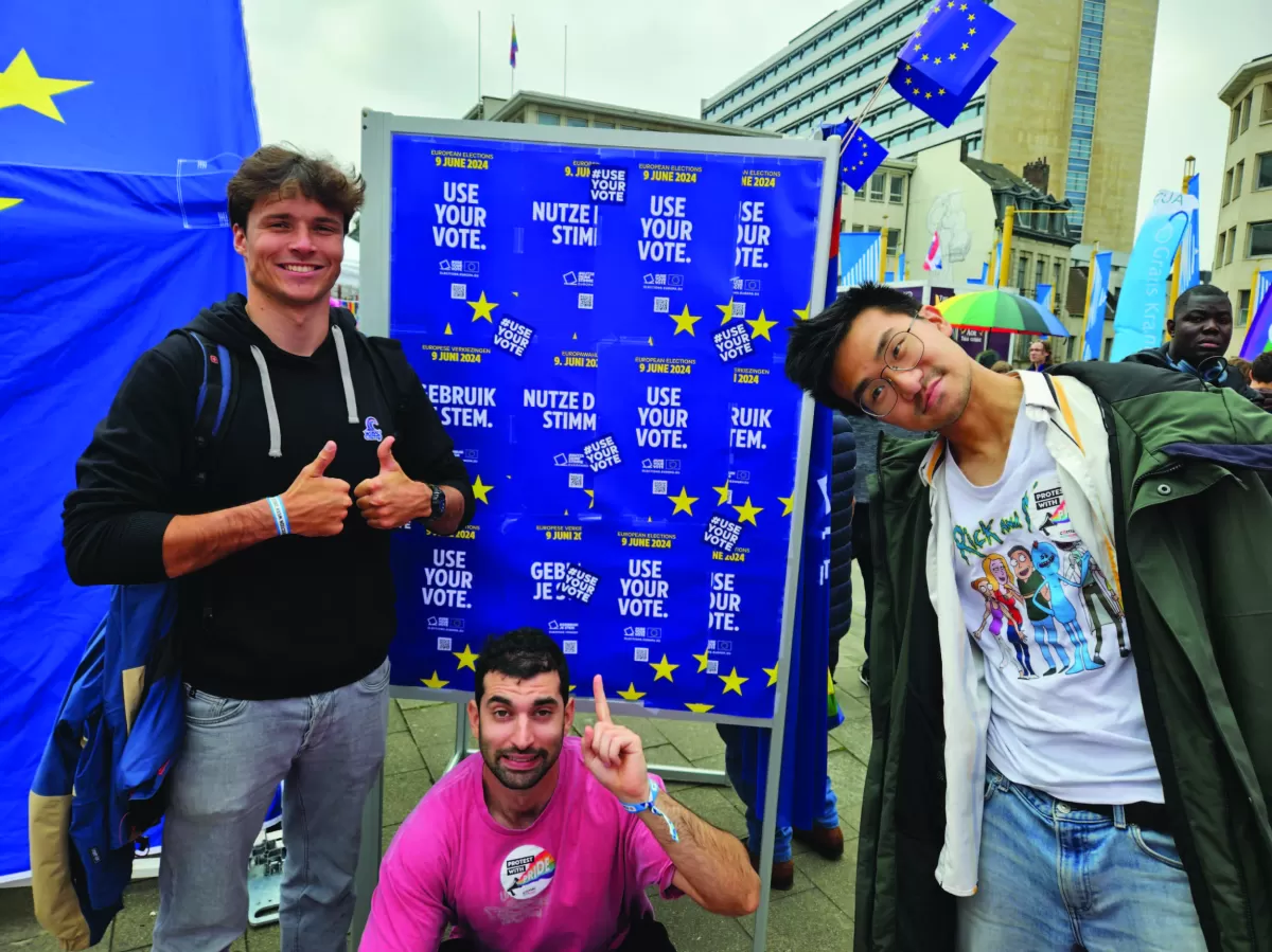 Posing in front of the EU Use Your Vote Stand