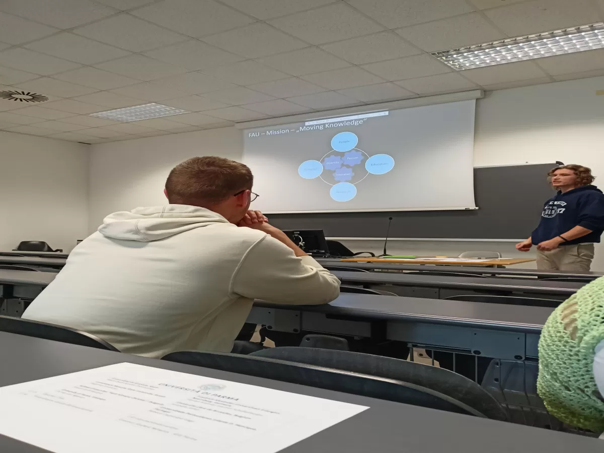 student from Germany holding a presentation