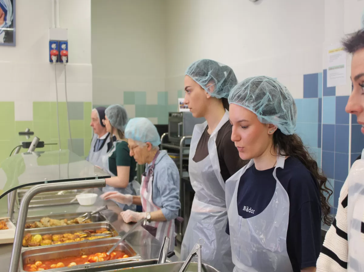 participants helping out in the soup kitchen