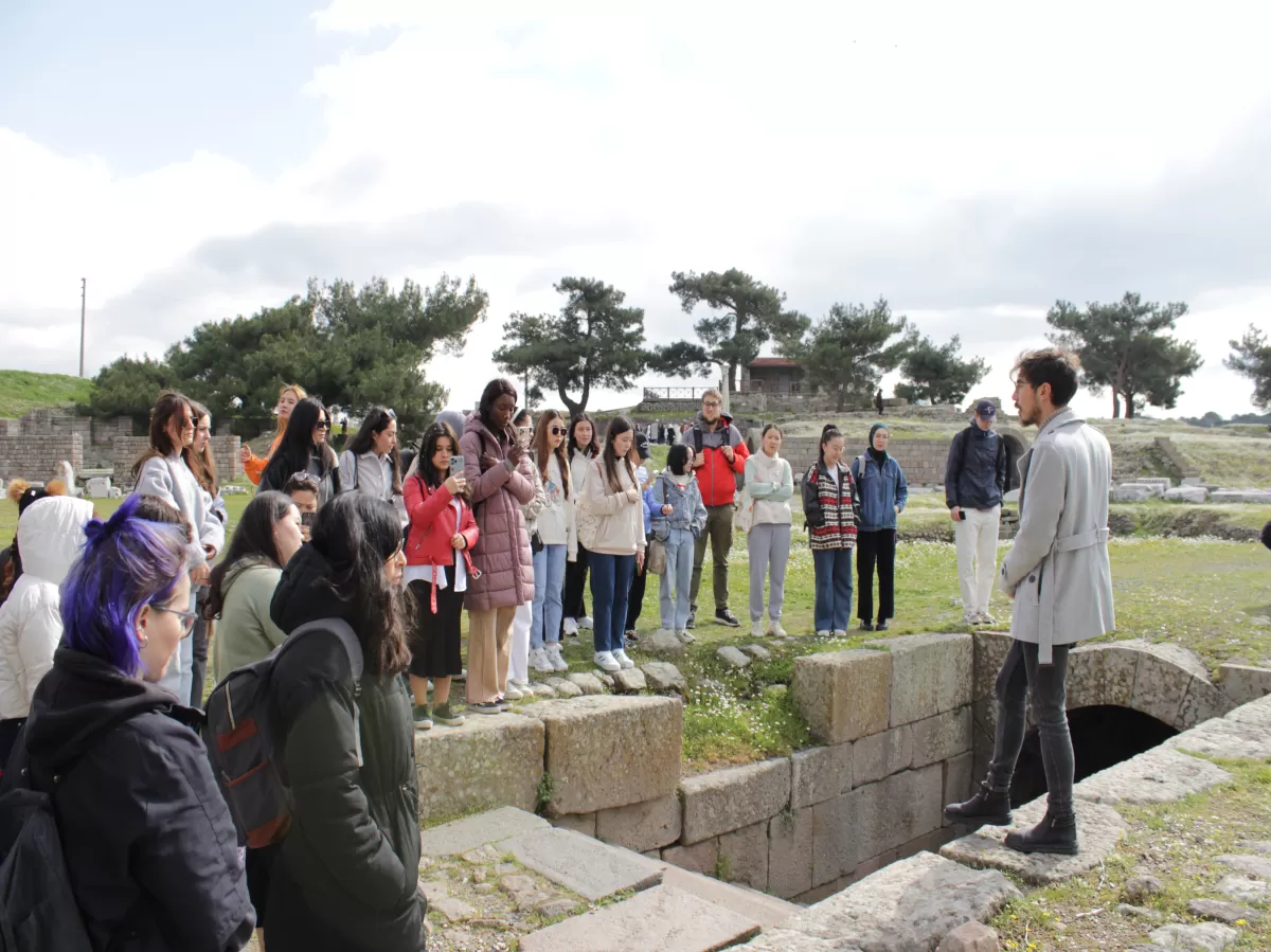 Our students listening to the tour guide who is mentioning about the history of Asklepieion.