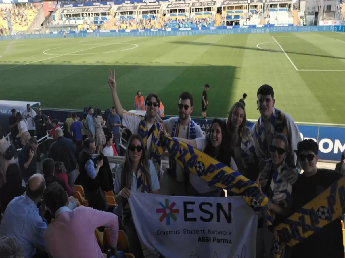 our participants at the stadium with the flag