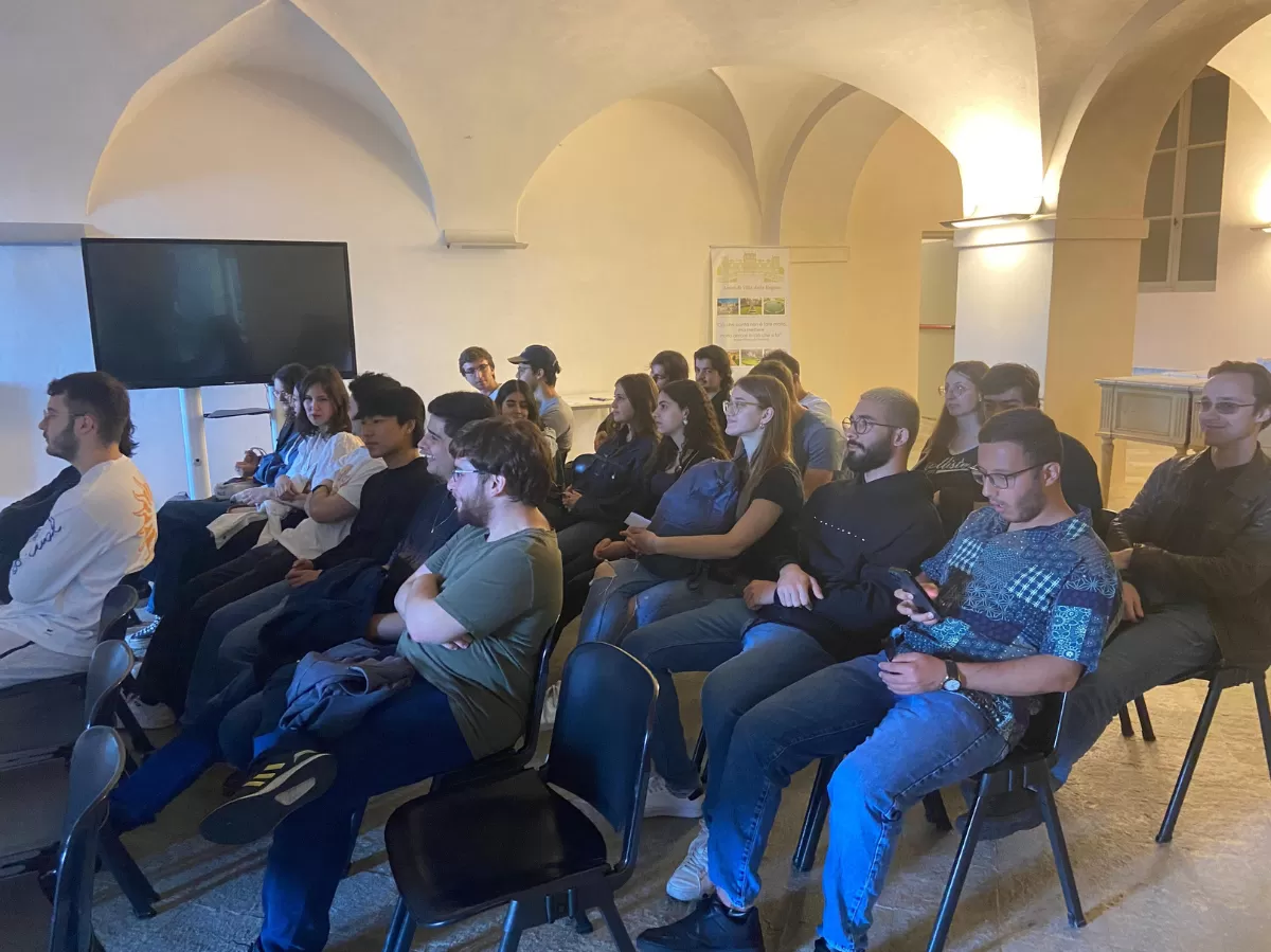 Group of international students listening to the tour guide