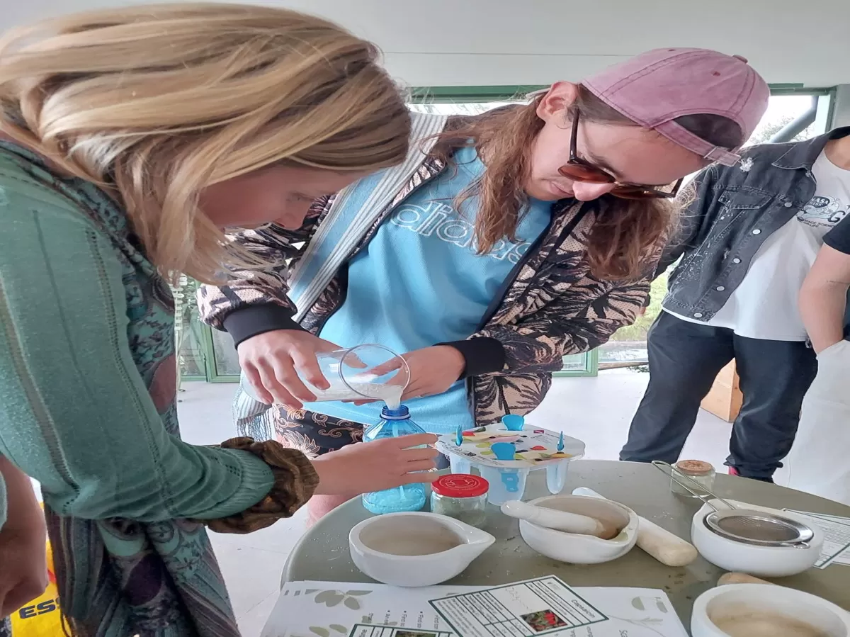 Two people making their tooth powders