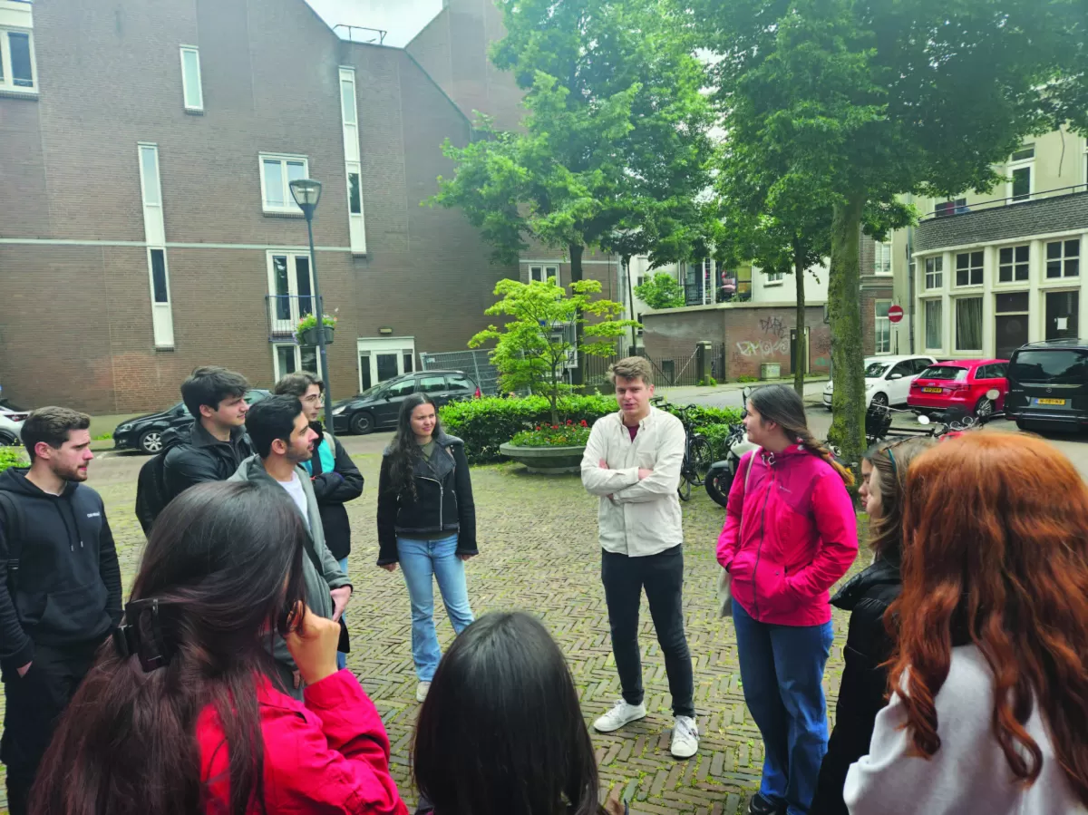 A picture taken during the city tour of Zwolle showing our tour guide and some participants