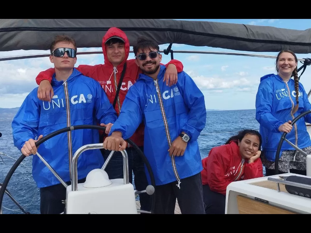 students steering the boat