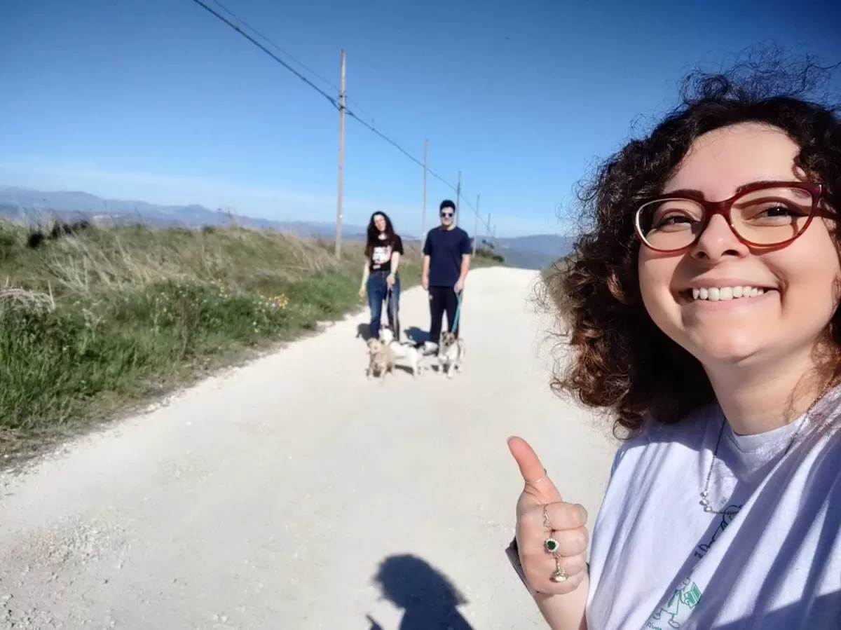 people walking with a dog