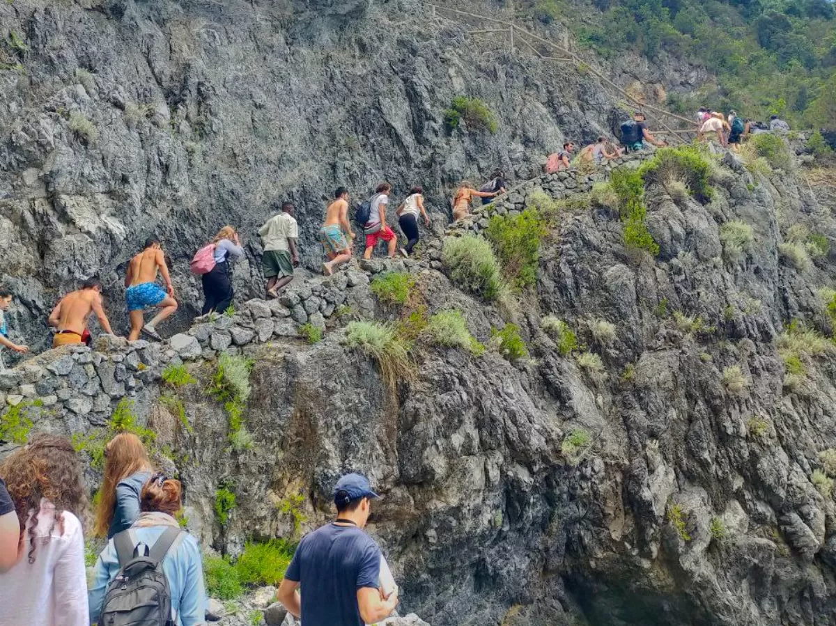 people hiking a mountain