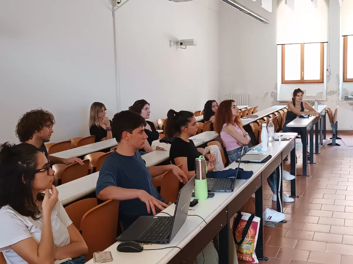 Students listening to a short presentation about ESN Ancona