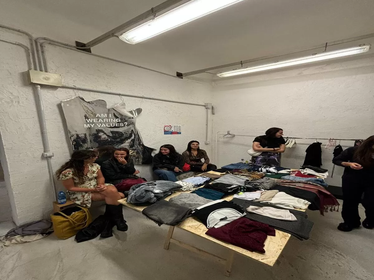 Students looking at clothes