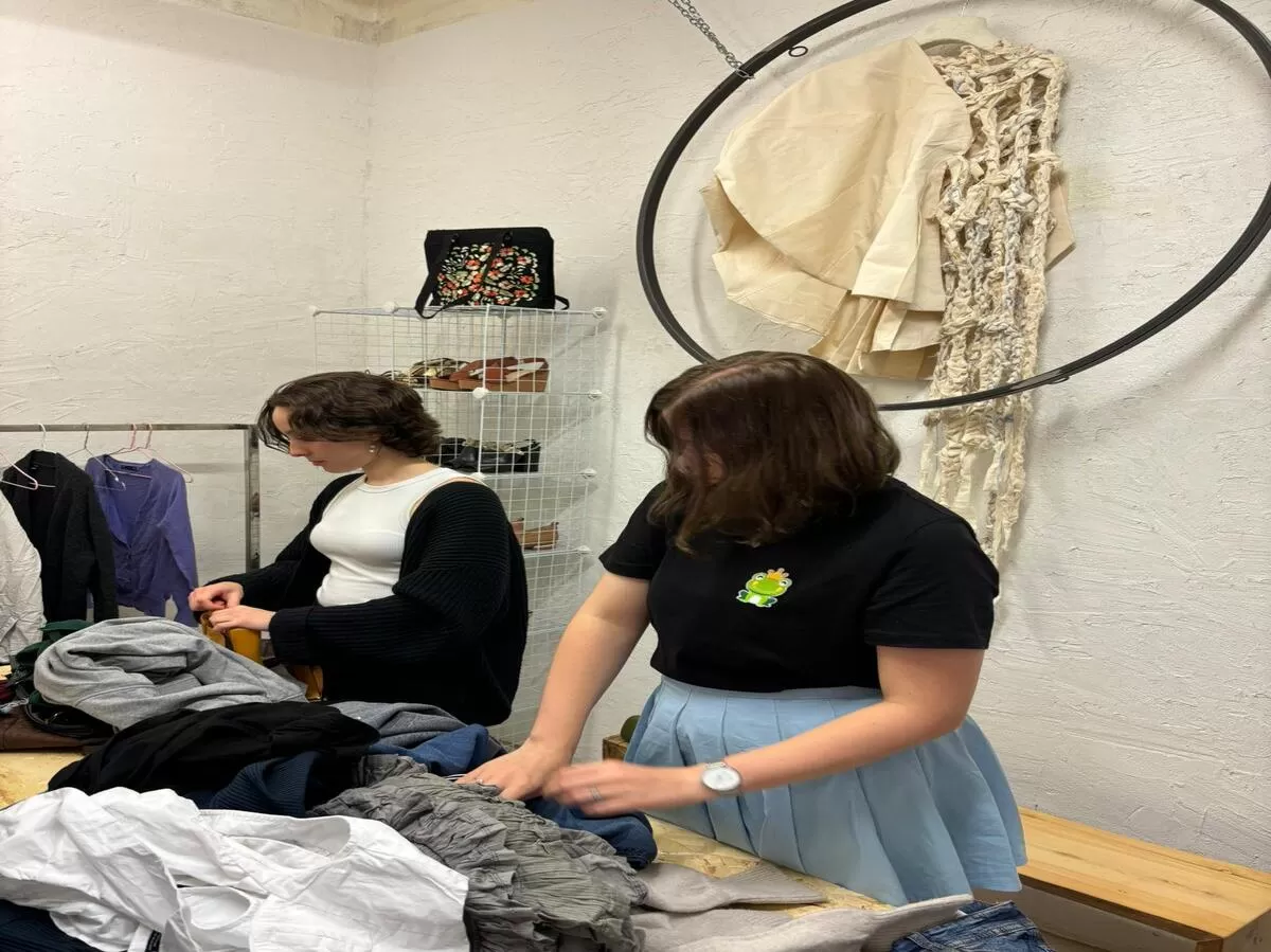 students looking at clothes