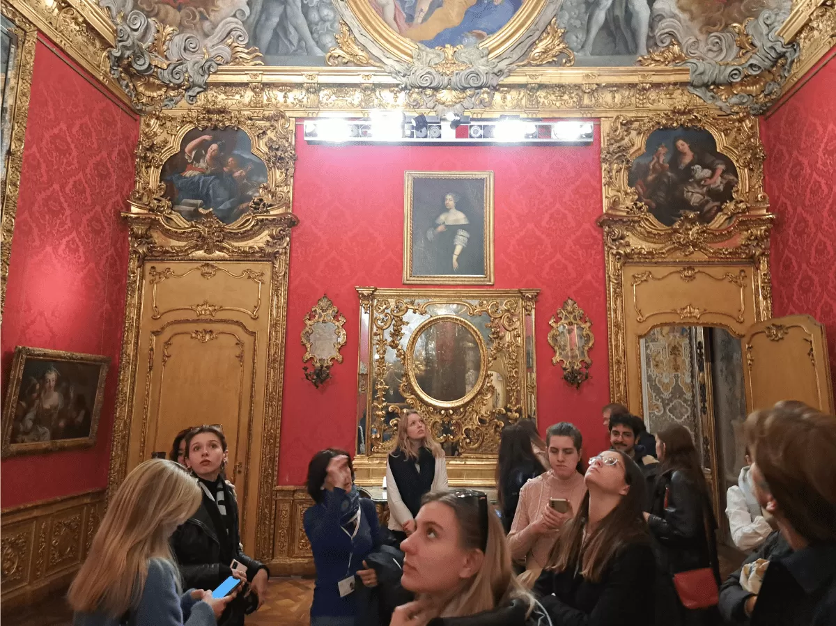 international students listening to the guide