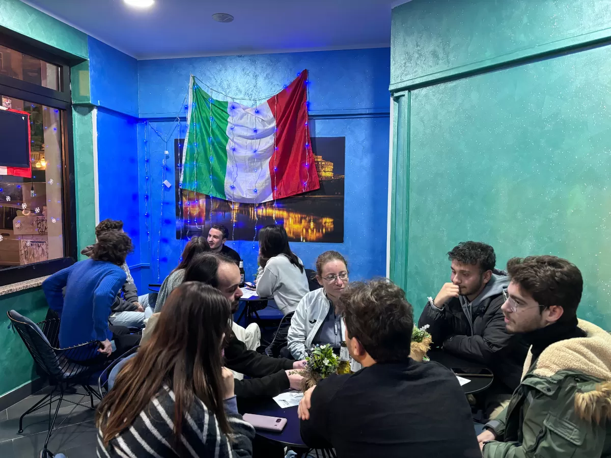 international students speaking in different groups