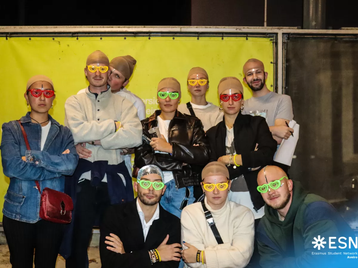 Photo group of international students with a costume at night.