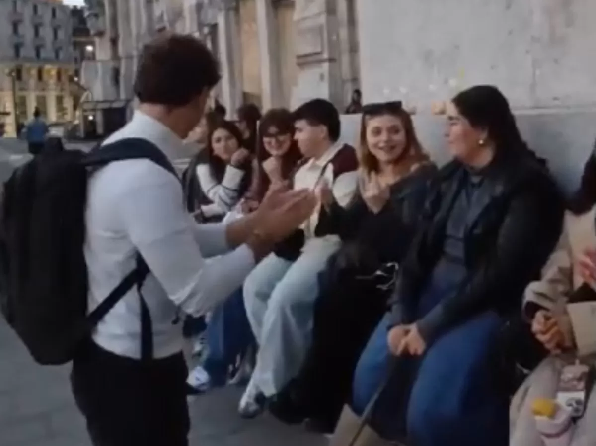 group picture with a clown clapping his hands