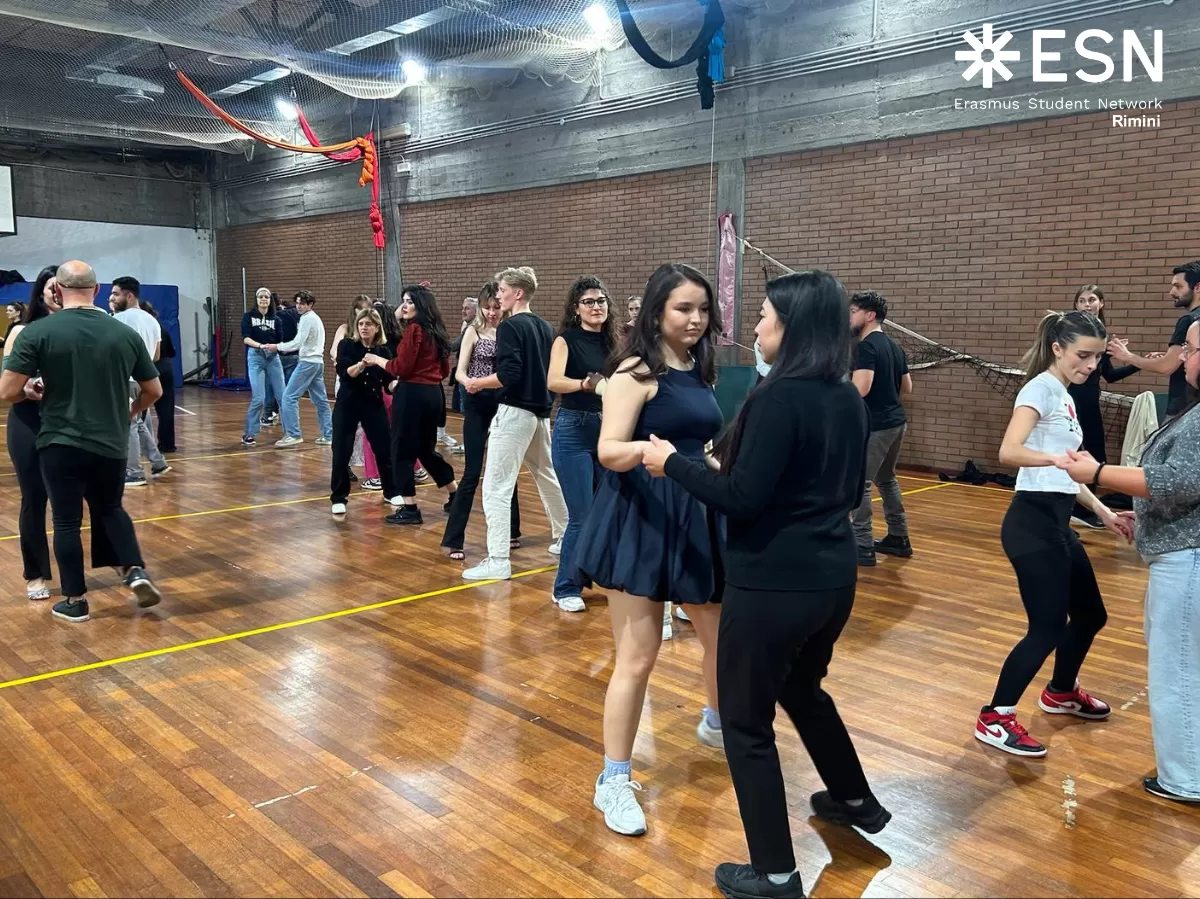 People practicing in couples.