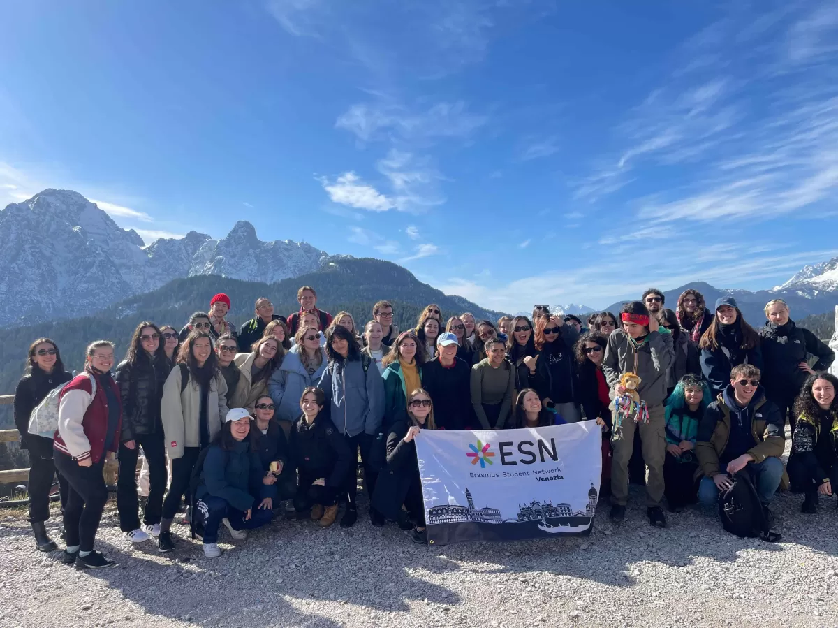 people smiling + ESN Venezia flag