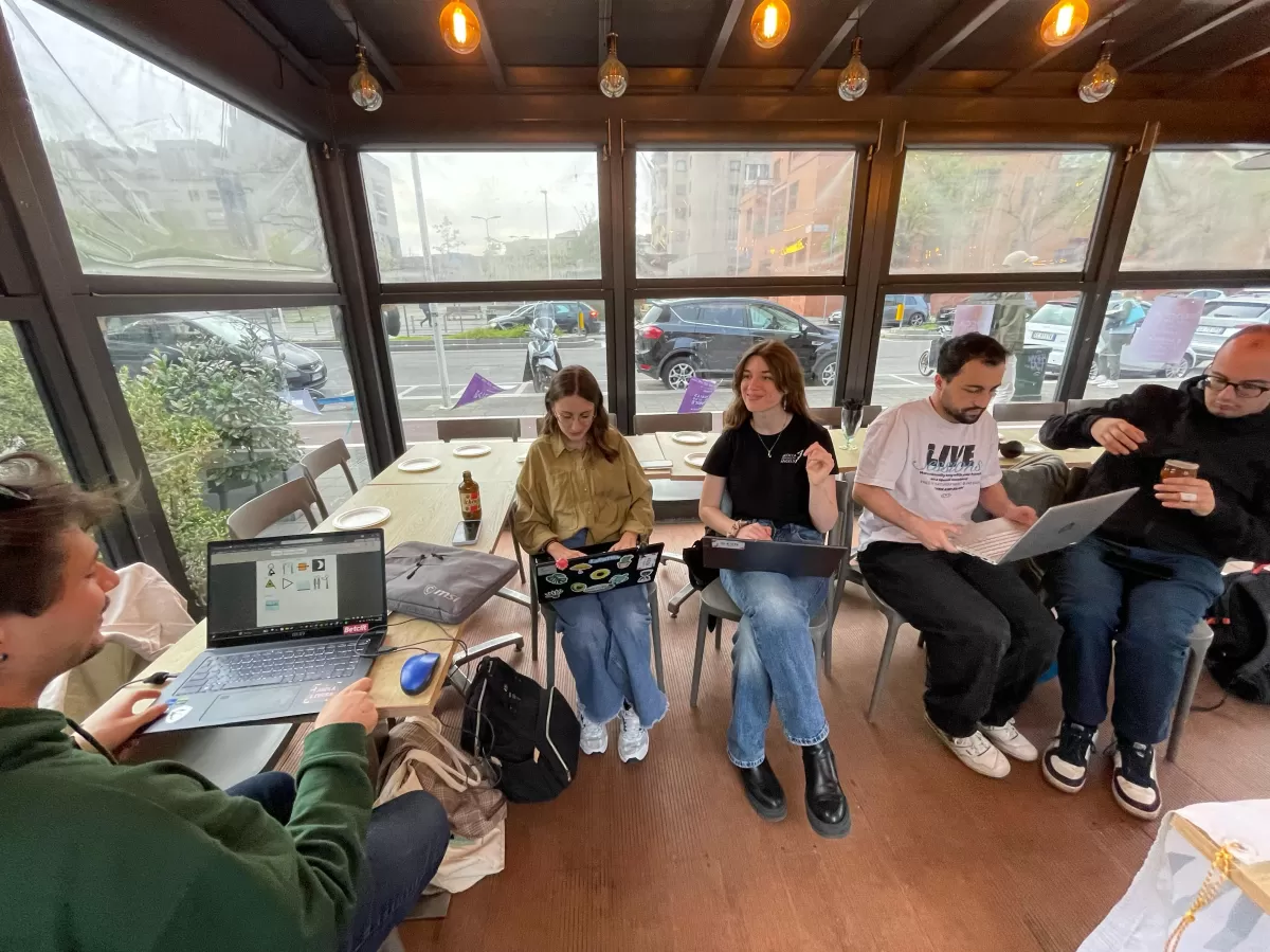 Volunteers and local students doing the workshop