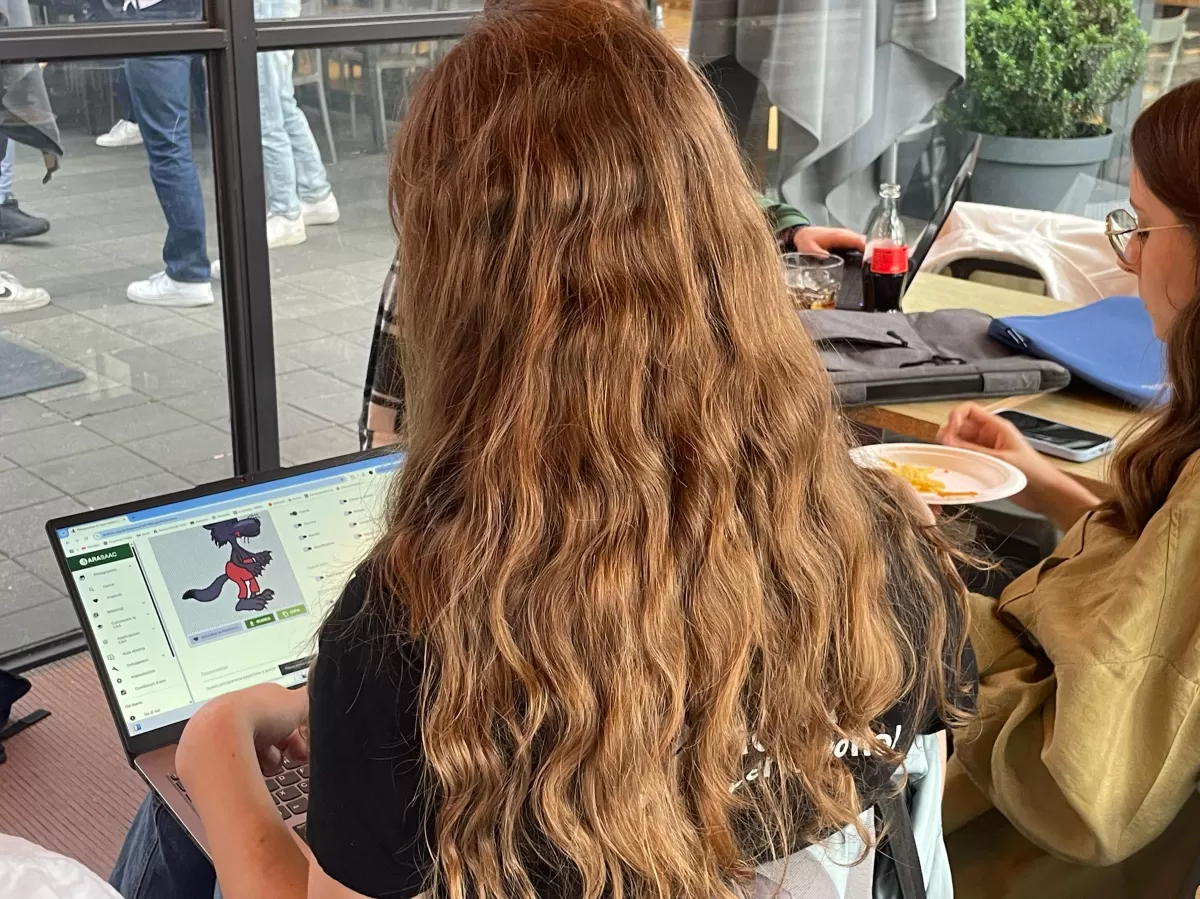 a local student using AAC symbols