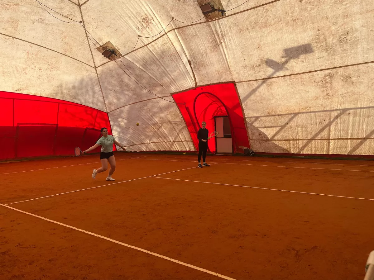 people playing tennis