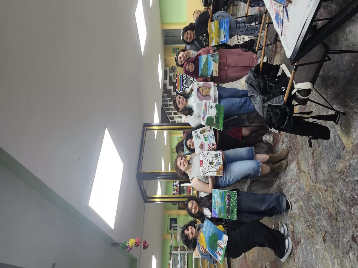 Participants showing their finished works