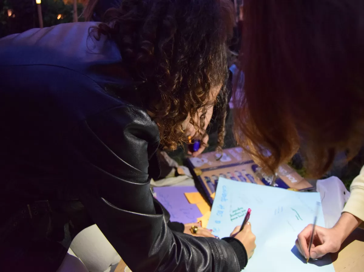 participants writing a key word for a safe space